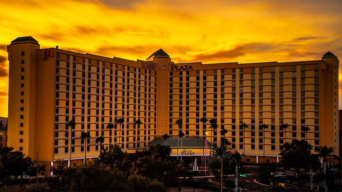 exterior of Rosen Plaza Hotel during sunset in Orlando, Florida, USA