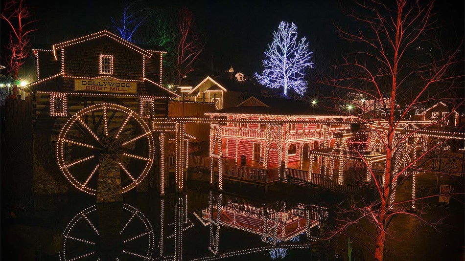 barn decorated with Christmas lights at night at Smoky Mountain Christmas at Dollywood in Pigeon Forge, Tennessee, USA