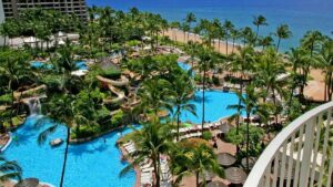 Aerial view of the swimming pools at Ka’anapali Beach Club on a sunny day in Maui, Hawaii, USA.