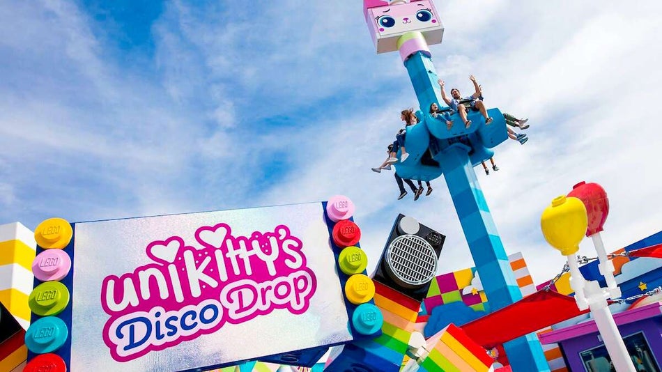Kids ride on the new Unikitty Disco Drop ride at LEGOLAND California