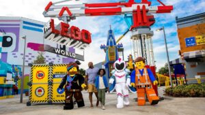 Kids walking with LEGOLAND characters at a meet-and-greet in San Diego, California, USA