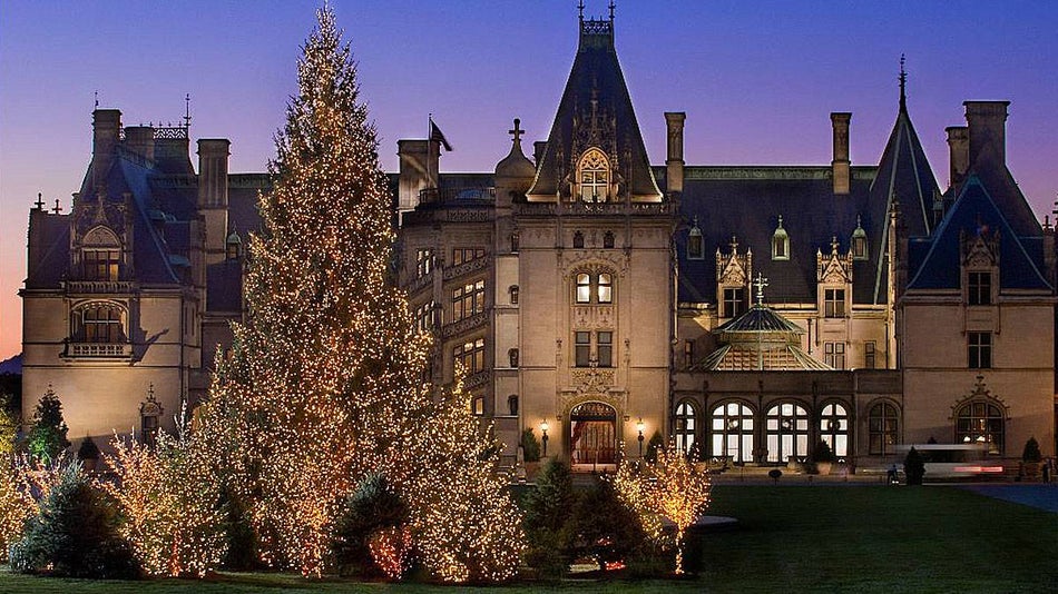 outside biltmore estate with lights on trees in Asheville, North Carolina, USA