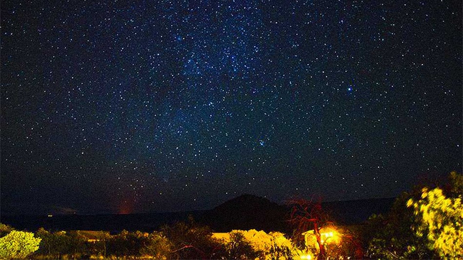 Night view of sky full of stars over Mauna Kea Volcano on Big Island, Hawaii, USA