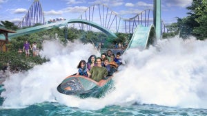 families riding down a flume on a water ride at seaworld san antonio