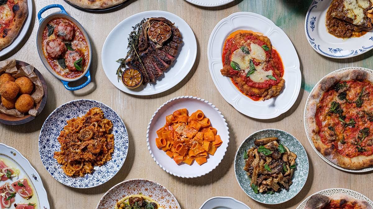 Looking down at several different plates of food from Alla Vita in Chicago, Illinois, USA