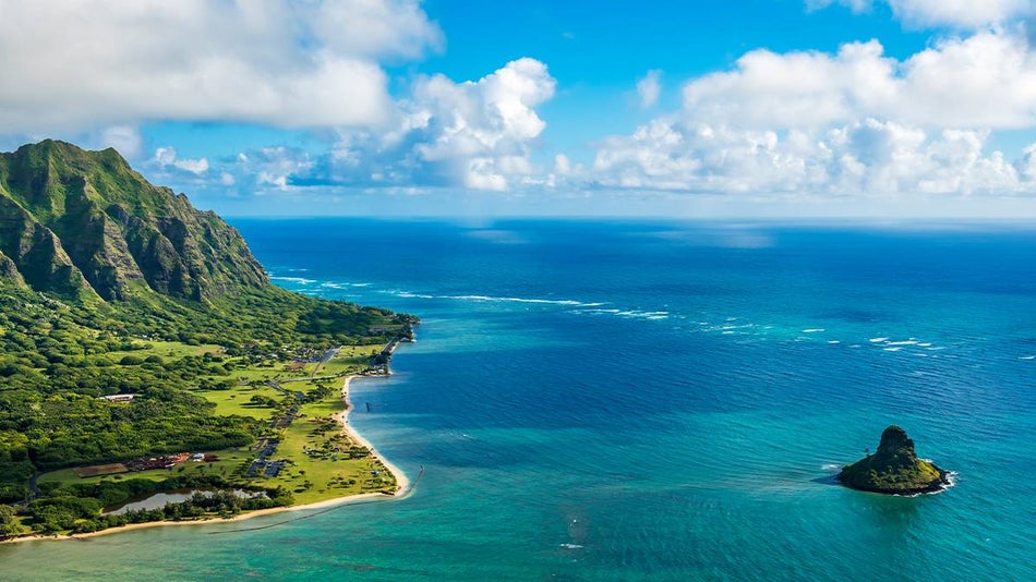 Aerial view of the coast of Oahu on a sunny day in Oahu, Hawaii, USA