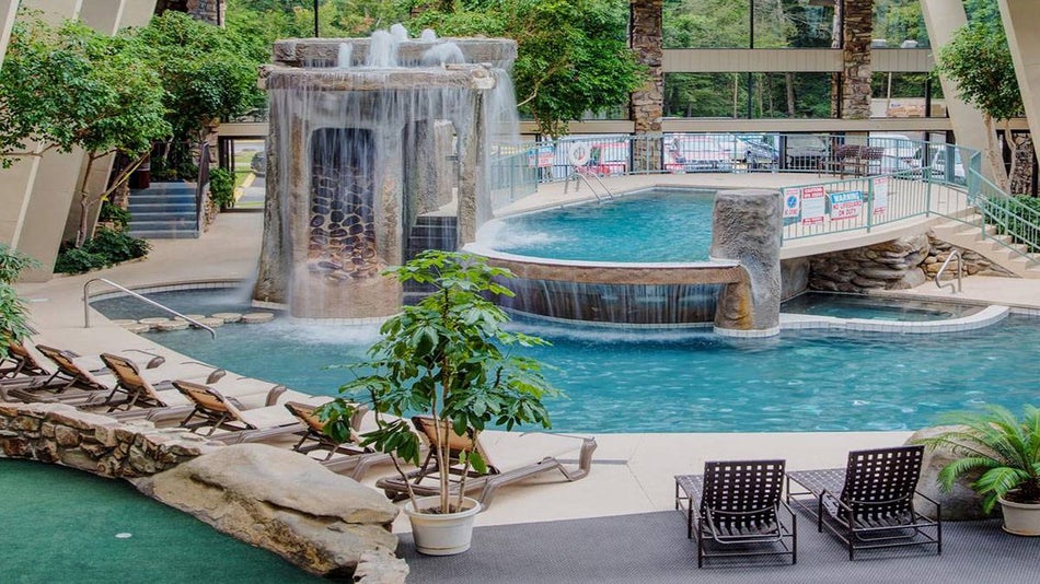 view of indoor pool and waterfall at Glenstone Lodge in Gatlinburg, Tennessee, USA