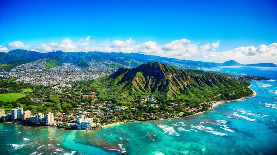 aerial view of hawaiian island with coastline during daytime