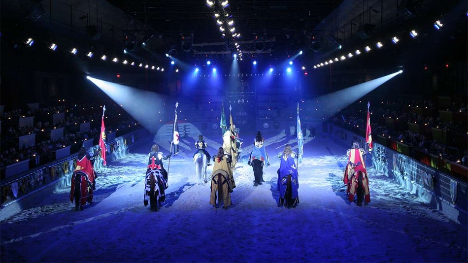 aerial view of knights on horses performing at the Medieval Times Dinner & Tournament in Los Angeles, California, USA