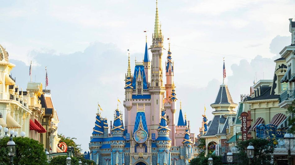 Ground view of Cinderella's Castle at Walt Disney World decorated for the 50th anniversary in Orlando, Florida, USA