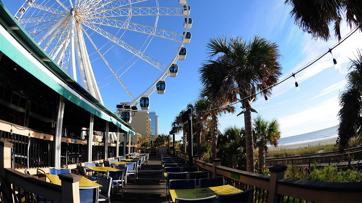 Outdoor dining area overlooking the ocean at Landshark Bar and Grill - Myrtle Beach, South Carolina, USA