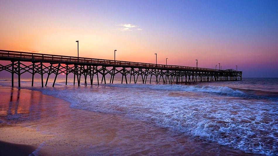 Surfside Beach Pier during sunset - Myrtle Beach, South Carolina, USA