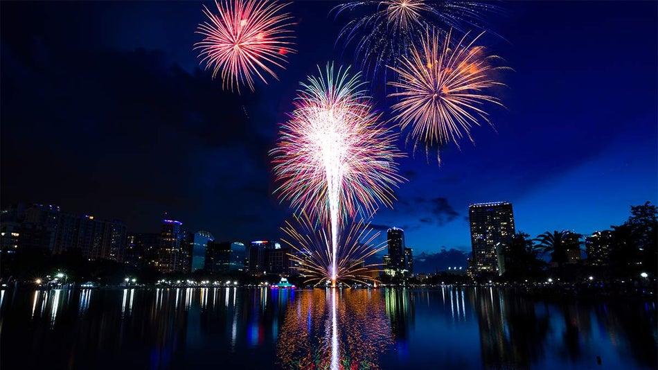 Fireworks over Lake Eola at night in Orlando, Florida, USA