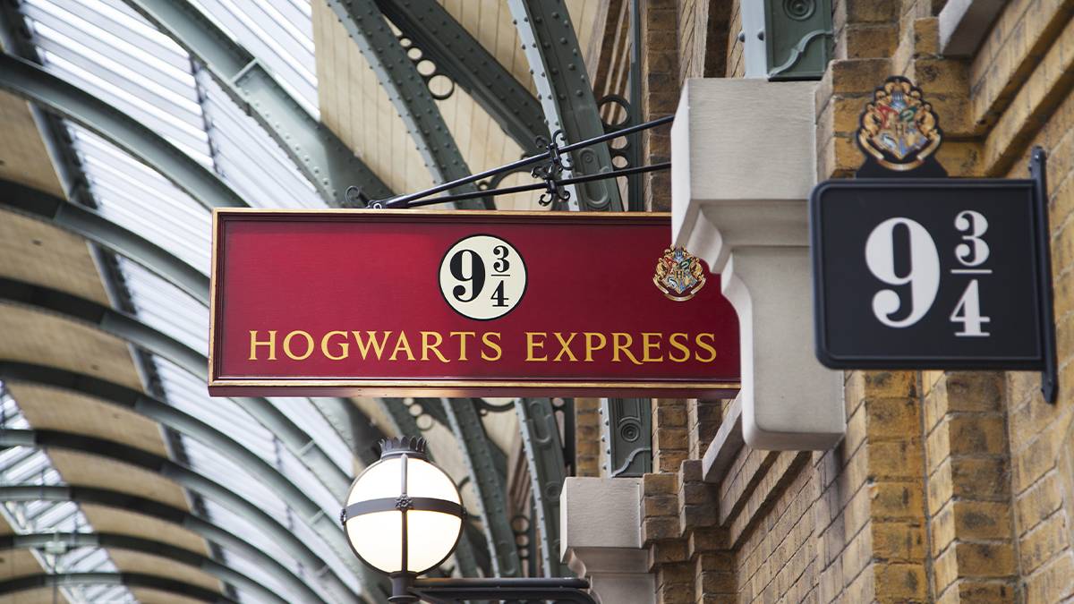 The nine and three quarters platform at Hogwarts™ Express Hogsmeade™ Station in Orlando, Florida, USA