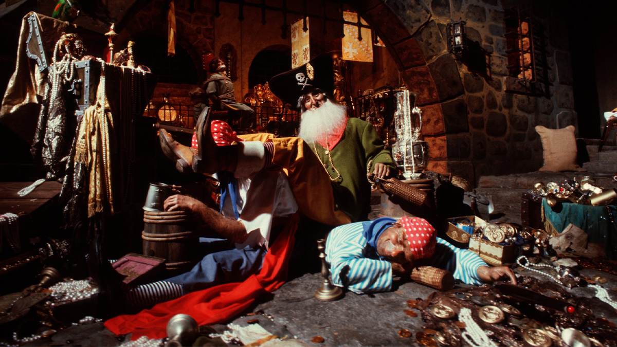 Close up photo of two drunk pirates surrounded by treasure on the Pirate of the Caribbean ride at Walt Disney World in Orlando, Florida, USA