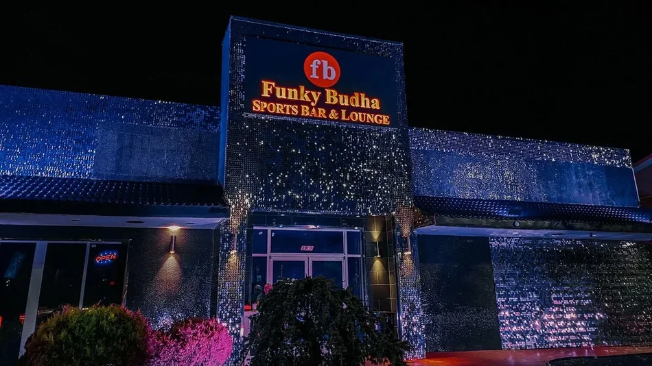 Exterior ground view of the Funky Budha Nightclub at night in Pigeon Forge, Tennessee, USA