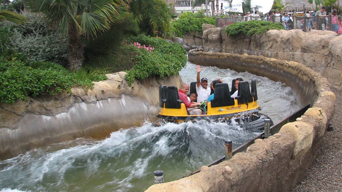 View of a family riding Shipwreck Rapids in SeaWorld San Diego in San Diego, California, USA