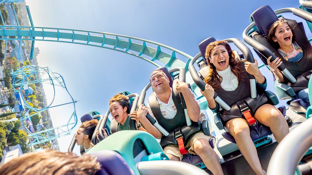 Close up of a family on the new Emperor Rollercoaster at SeaWorld on a sunny day in San Diego, California, USA