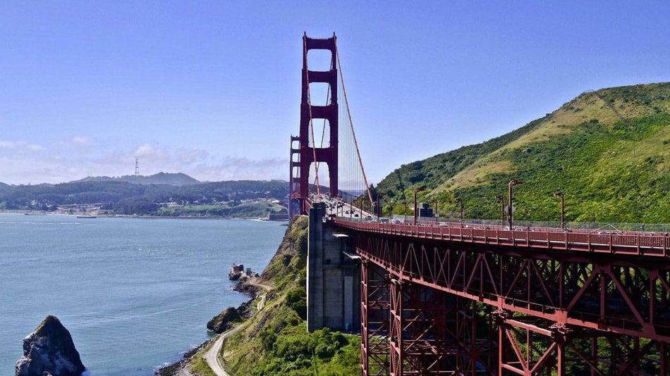 Lower view of Golden Gate Bridge with San Francisco Bay at the side