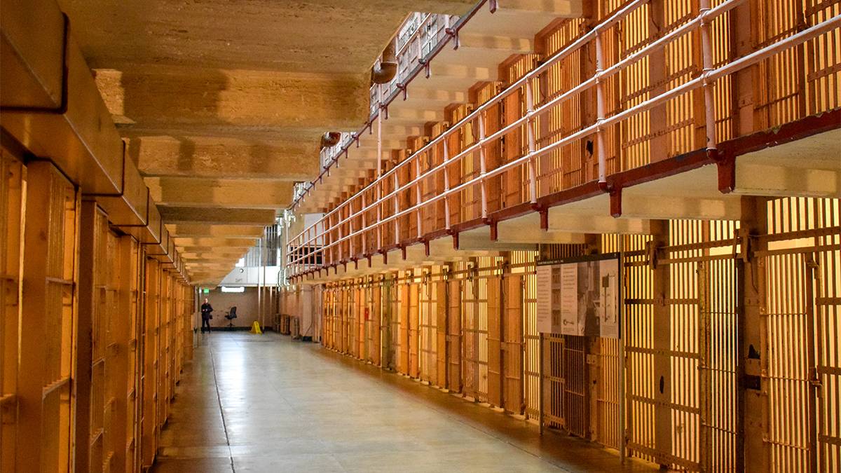 view of doors and cells during a self-guided audio tour through Alcatraz Island in San Francisco, California, USA