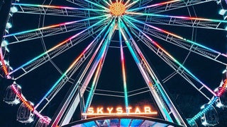 Photo looking up at the SkyStar with the lights on as part of Illuminate SF Festival of Lights in San Francisco, California, USA