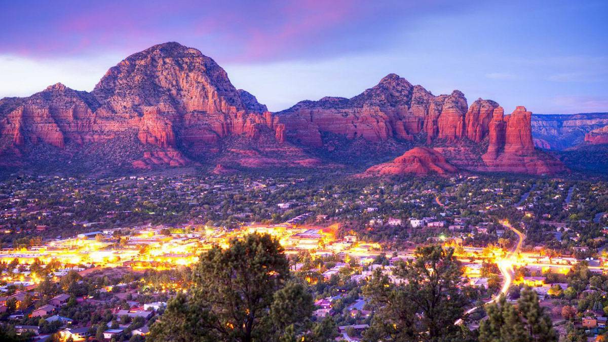 Aerial overview of Sedona at night with City lights