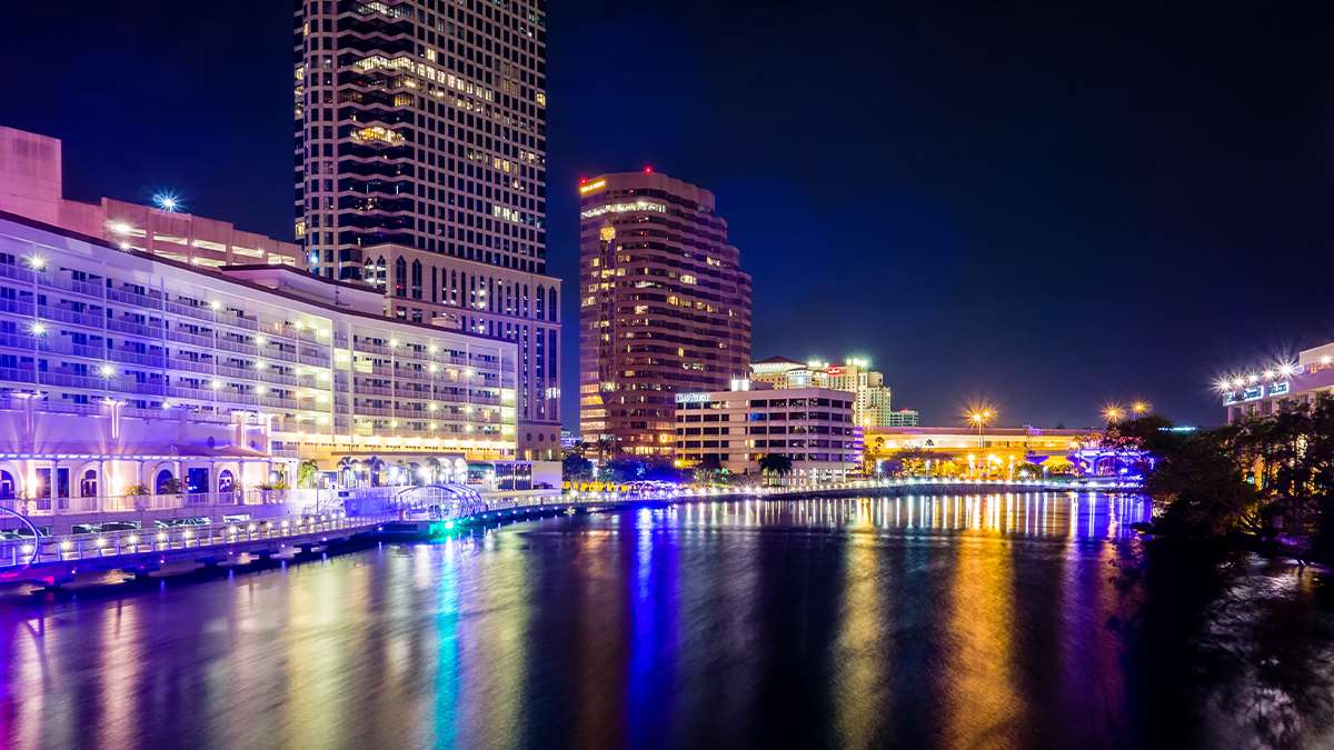 View of the downtown Tampa lights at night with the lights going over the water in Tampa, Florida, USA