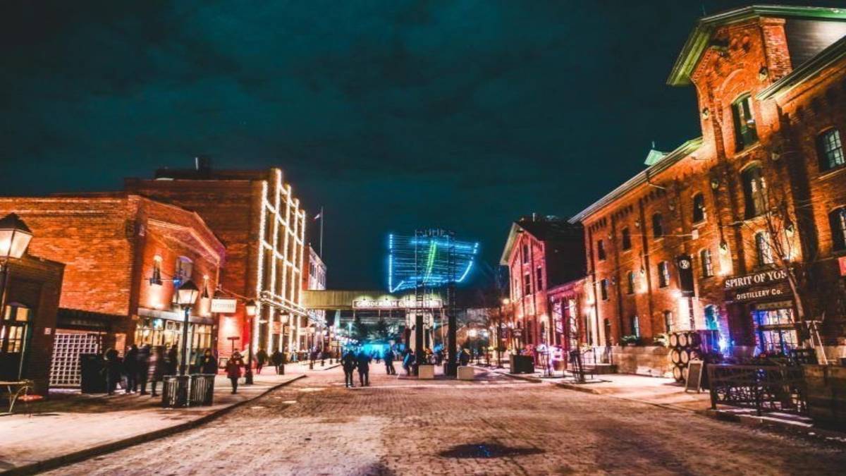 Ground view of Historic Distillery District at night with lights in Toronto, Ontario, Canada