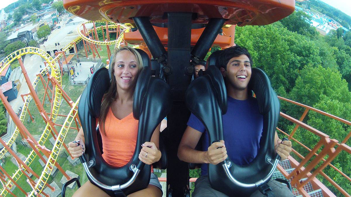 guests riding the Mind Eraser roller coaster at Six Flags America in Washington, D.C. USA