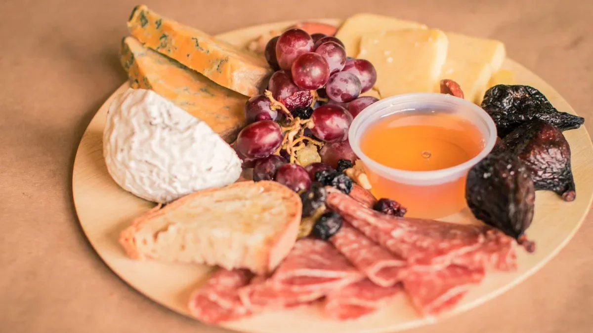 close up of bread meats and cheese plate at The Cheese Shop in Williamsburg, Virginia, USA