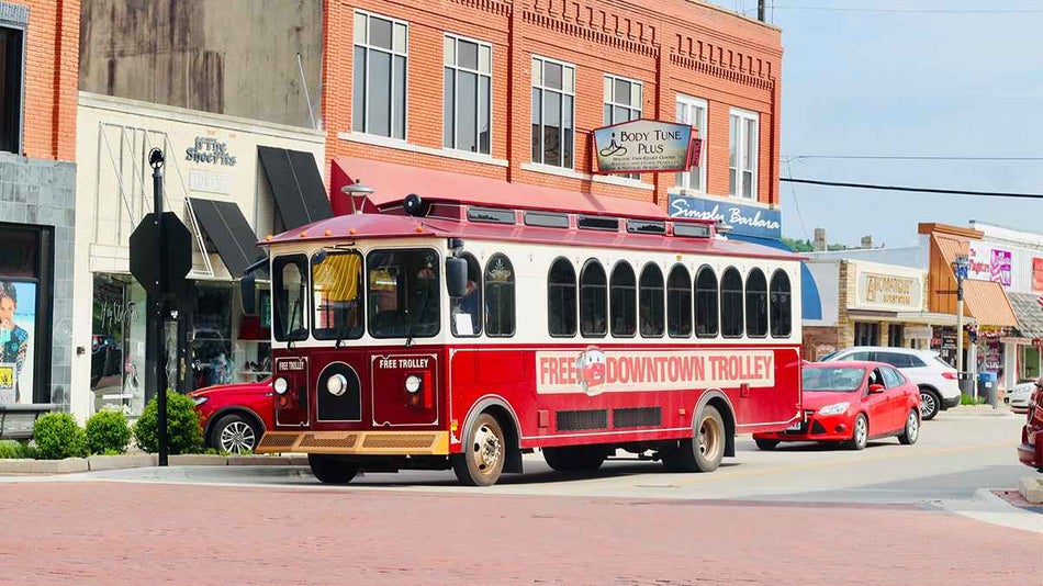 close up of two red trolley's downtown in Branson, Missouri, USA
