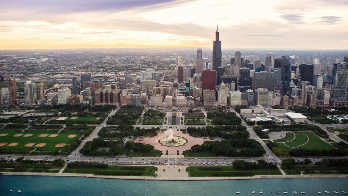 aerial view of chicago illinois grant park at sunset with skyline in background