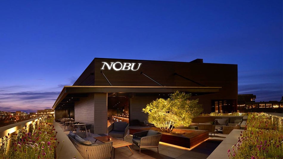 Wide shot of the lounge area on the roof top of the Nobu Hotel in Chicago, Illinois, USA