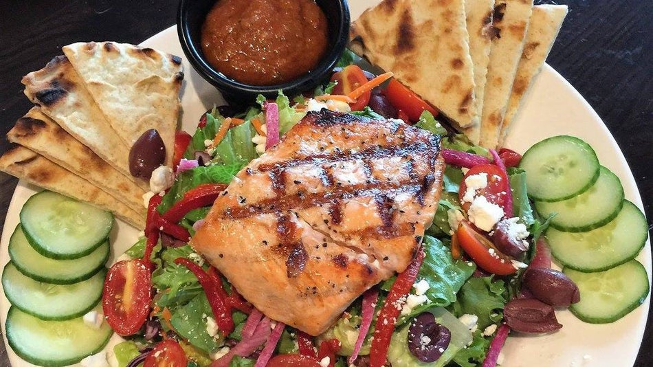 Close up of a Meditteranean Salad with Grilled Salmon from Local Goat in Gatlinburg, Tennessee, USA