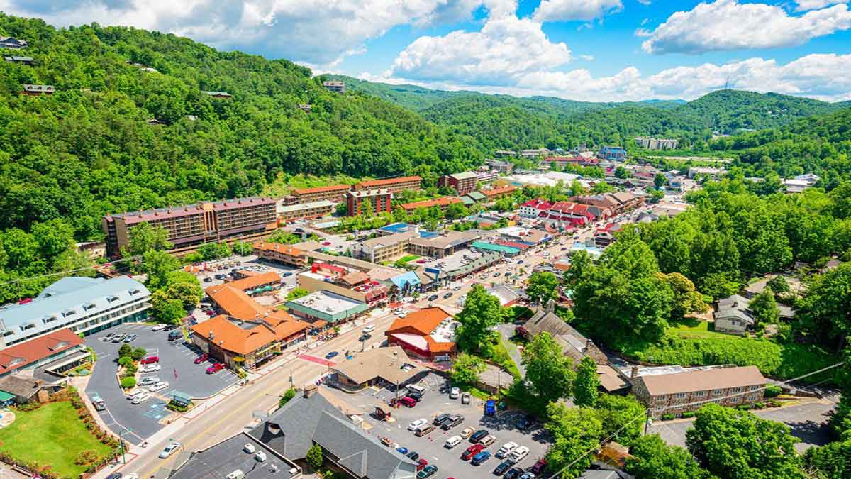 Gatlinburg, Tennessee, USA downtown viewed from above in the summer season.