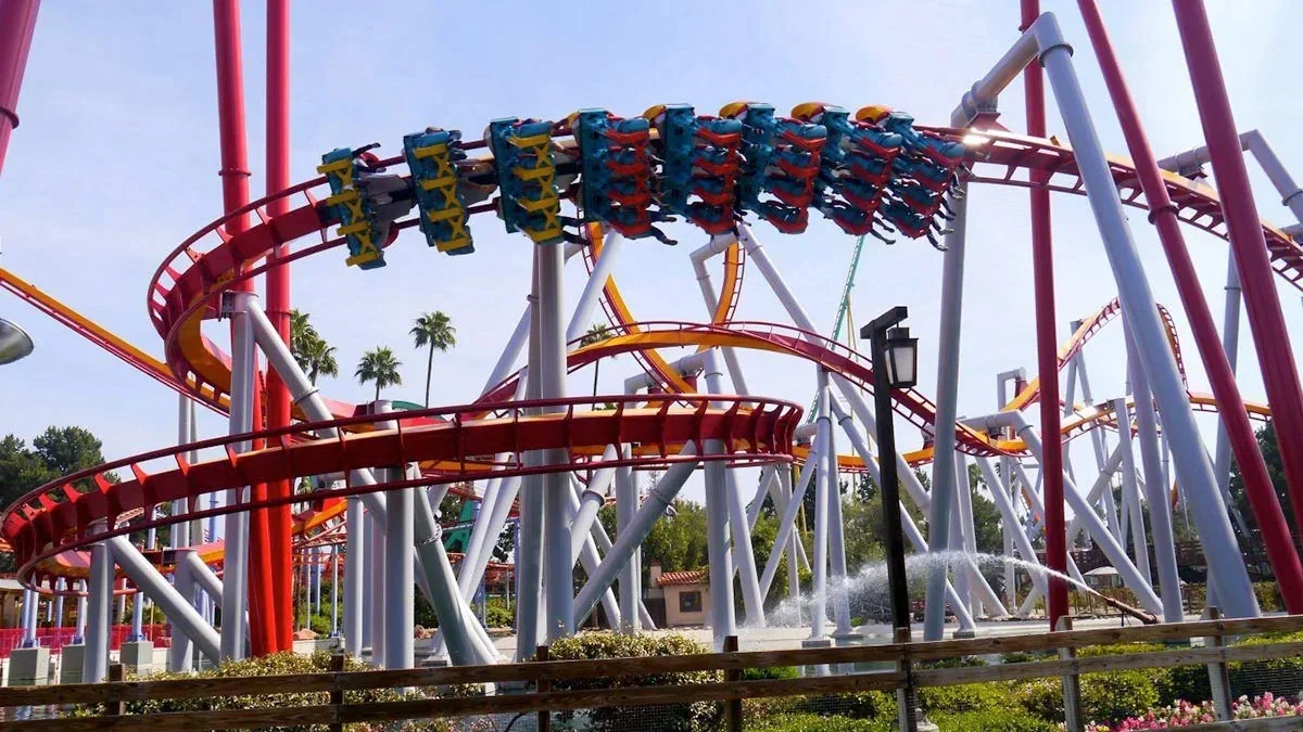 sunny day at Knott's Berry Farm with silver bullet roller coaster on loop in Los Angeles, California, USA