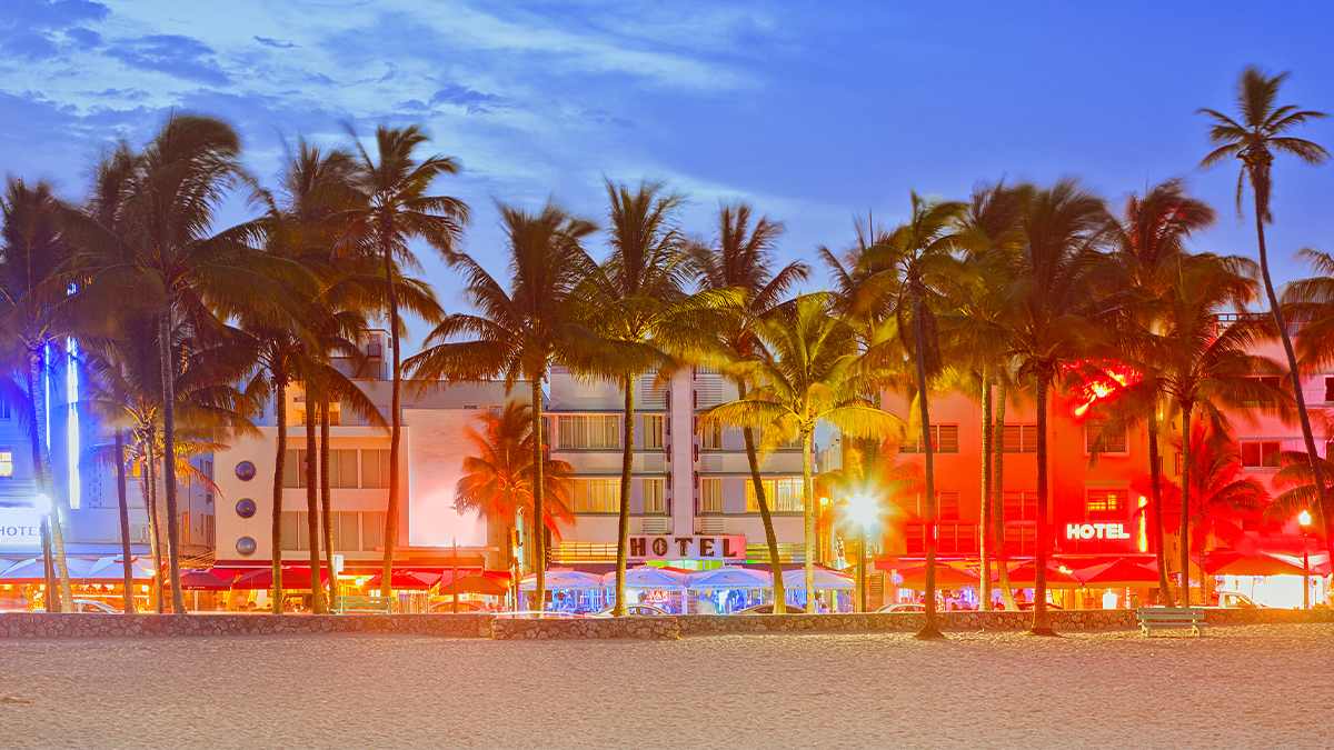 colorful buildings with lights at sunset at South Beach in Miami, Florida, USA