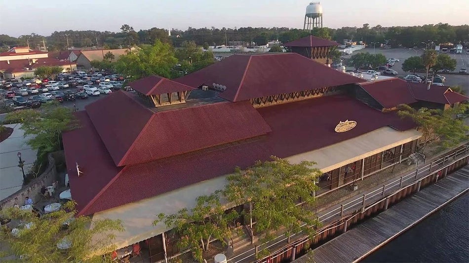 Exterior View of Greg Norman’s Australian Grille at Barefoot Landing and Water with Boat - Myrtle Beach, South Carolina, USA