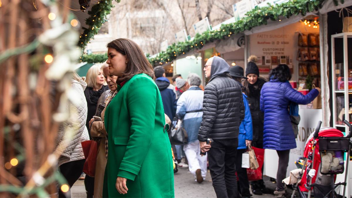 People shopping at Union Square Holiday Market in NYC, New York, USA