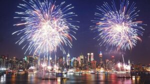 fireworks over Hudson River with skyline in background in NYC, New York, USA