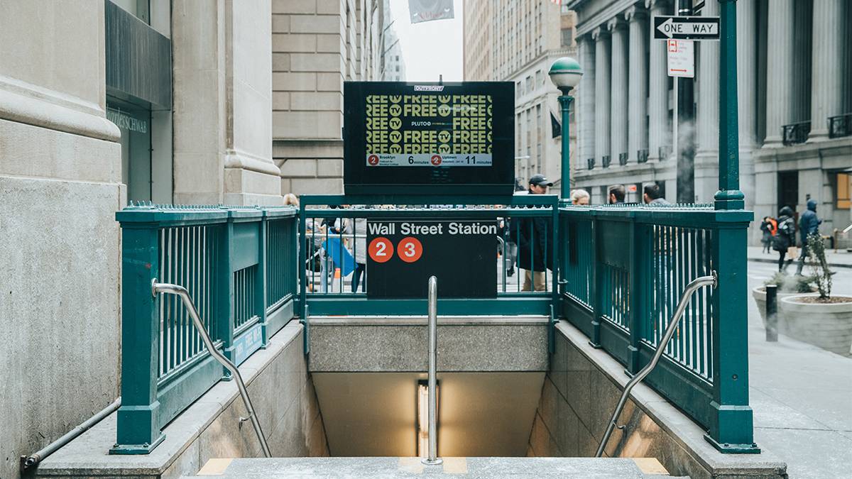 street view of sidewalk entrance into subway station in NYC, New York, USA