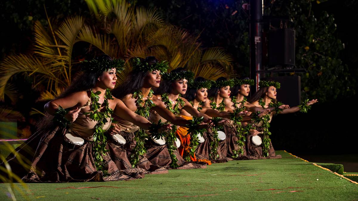 Hula dancer performing at Paradise Cove Luau in Oahu, Hawaii, USA
