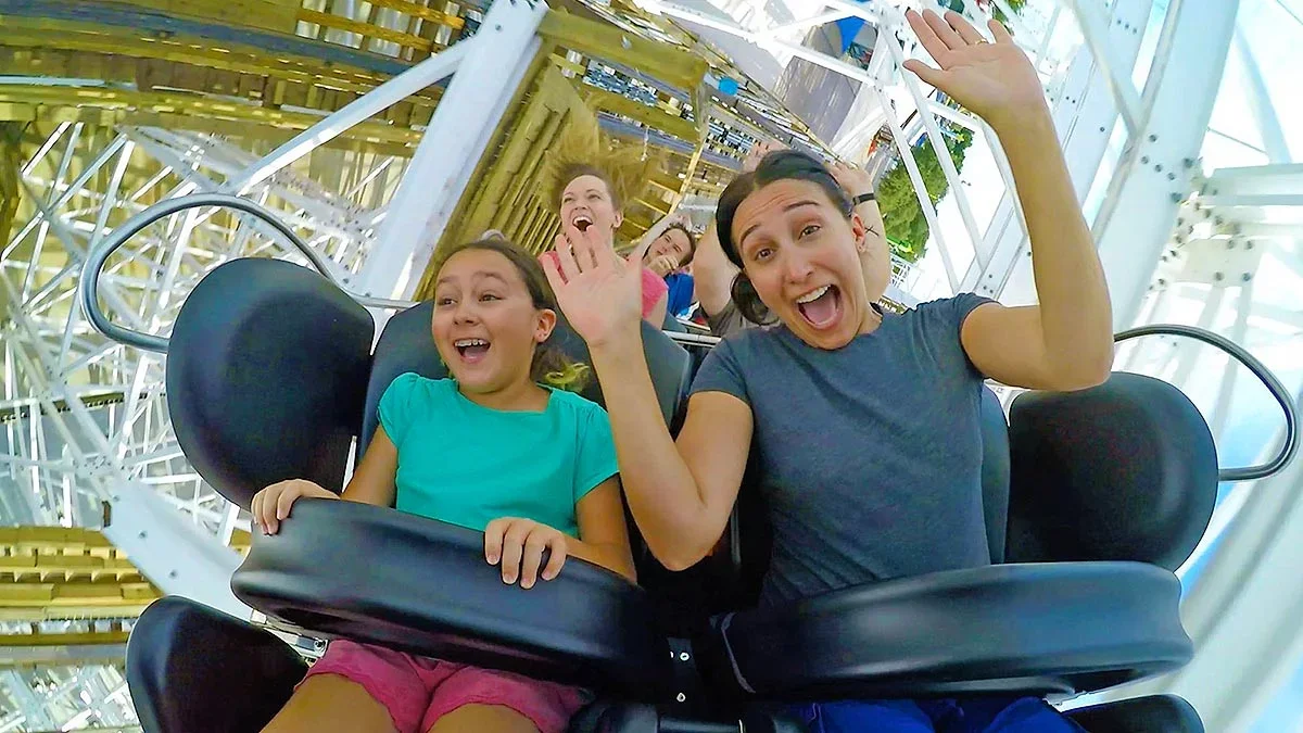 people on the White Lightning coaster at Fun Spot America Theme Parks in Orlando, Florida, USA