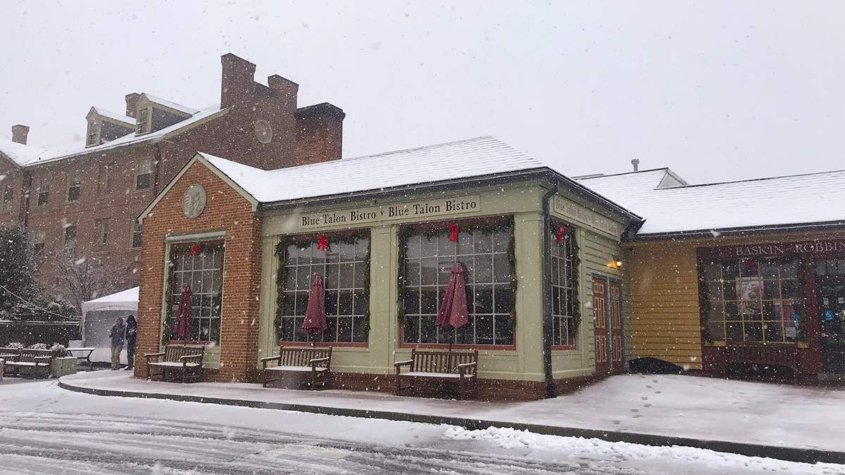 Exterior of the Blue Talon Bistro on a snowy winter day in Williamsburg, Virginia, USA