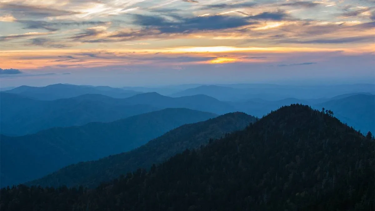 Wide shot of the Great Smoky Mountains at sunset near Gatlinburg, Tennessee, USA