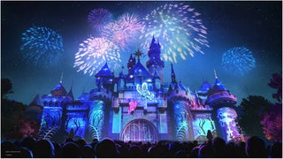 Fireworks at night over Sleeping Beauty's castle for Disney 100