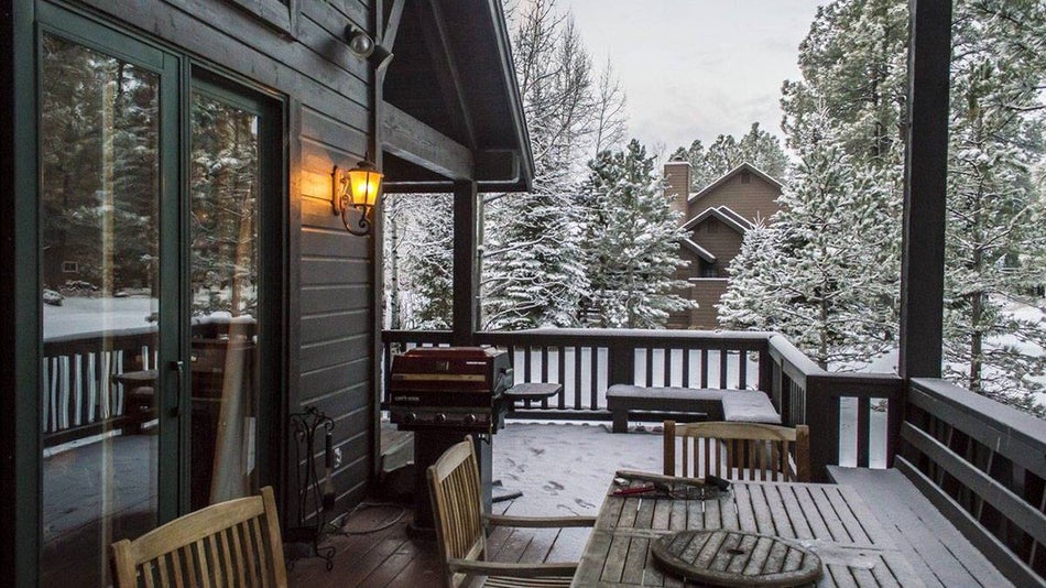 Snowfall on Cabin Outdoor Space