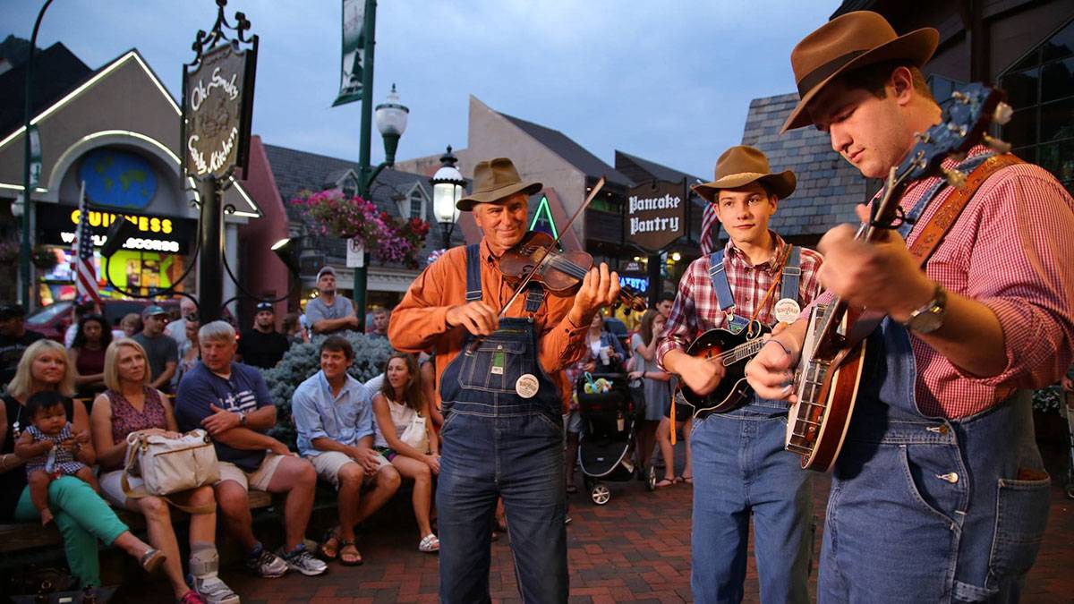 close up of musicians on street in the evening at Smoky Mountain Tunes and Tales in Gatlinburg, Tennessee, USA