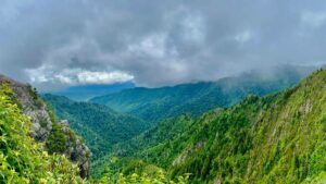 aerial view of Great Smoky Mountains National Park with cloudy grey skies in Gatlinburg, Tennessee, USA