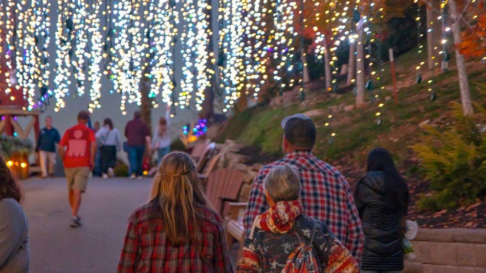 close up of family walking through Anakeesta lights in Gatlinburg Tennessee USA